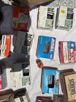 Huge lot of various nails and screws most 3/4 filled to completely filled. All sizes - there are 31 boxes in this lot