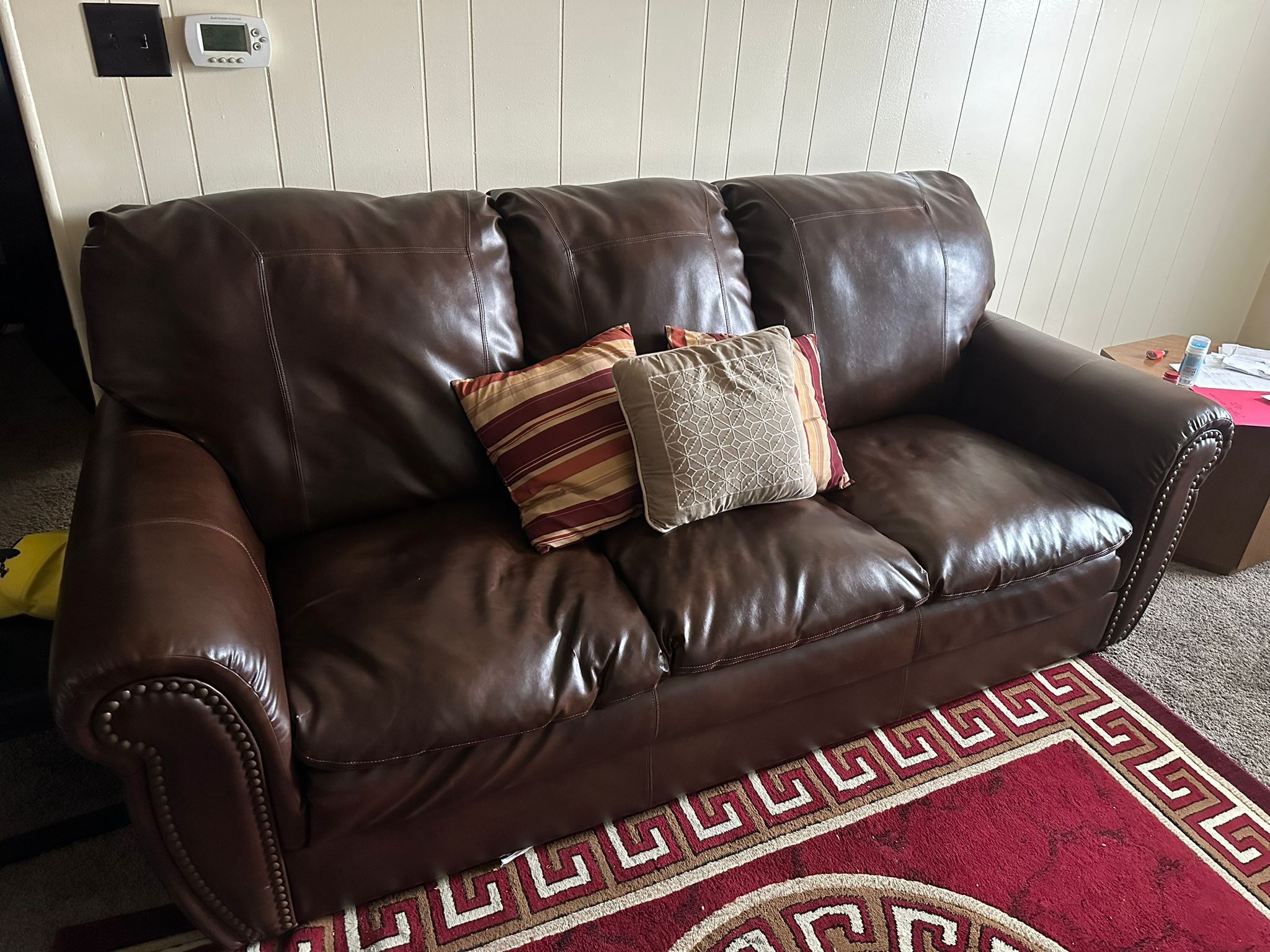 Living Room Set For $680 (Coughs, Recliner Leather Chair, 2 Small tables and Red Rug)