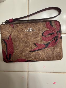 coach signature floral wristlet