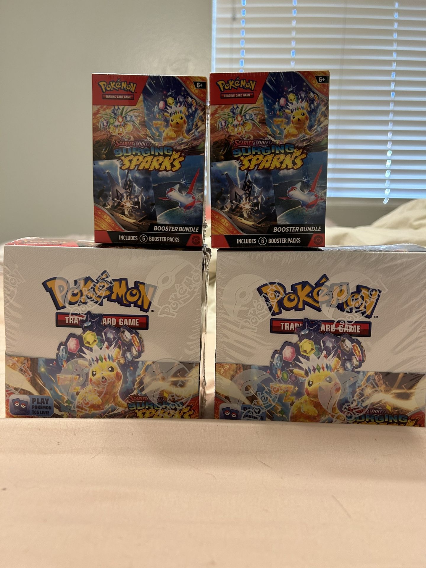 Surging Sparks Booster Box And Bundles