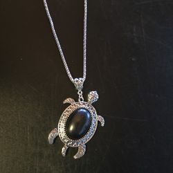 Heather and Bumble

Silver & Blue Turtle Necklace