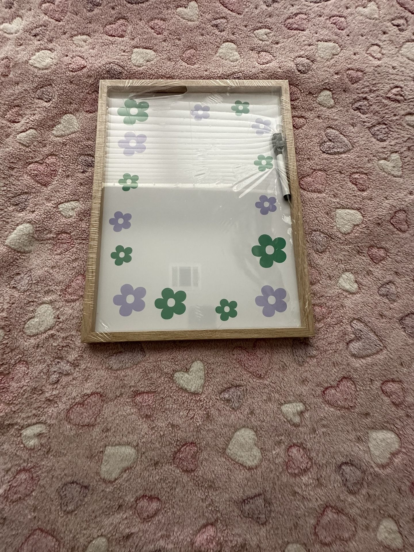 white board with flowers 12inx16in