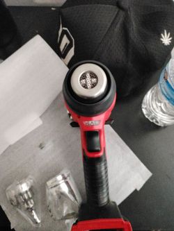 Milwaukee M18™ Compact Heat Gun (Model 2688-20). It’s a cordless power tool used for tasks like shrinking heat-shrink tubing, bending PVC pipe, stripp