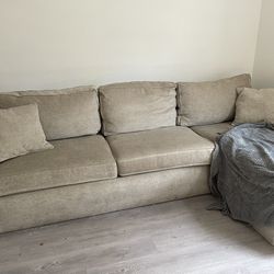 Beige Couch With Pull Out And Storage 