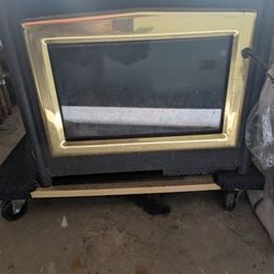 WOOD FIRE PLACE INSERT... MANUAL INCLUDED... PRICE IS FIRM!!! IF YOU SEE POST IT'S AVAIL... 