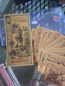 Silver and gold coins and foils