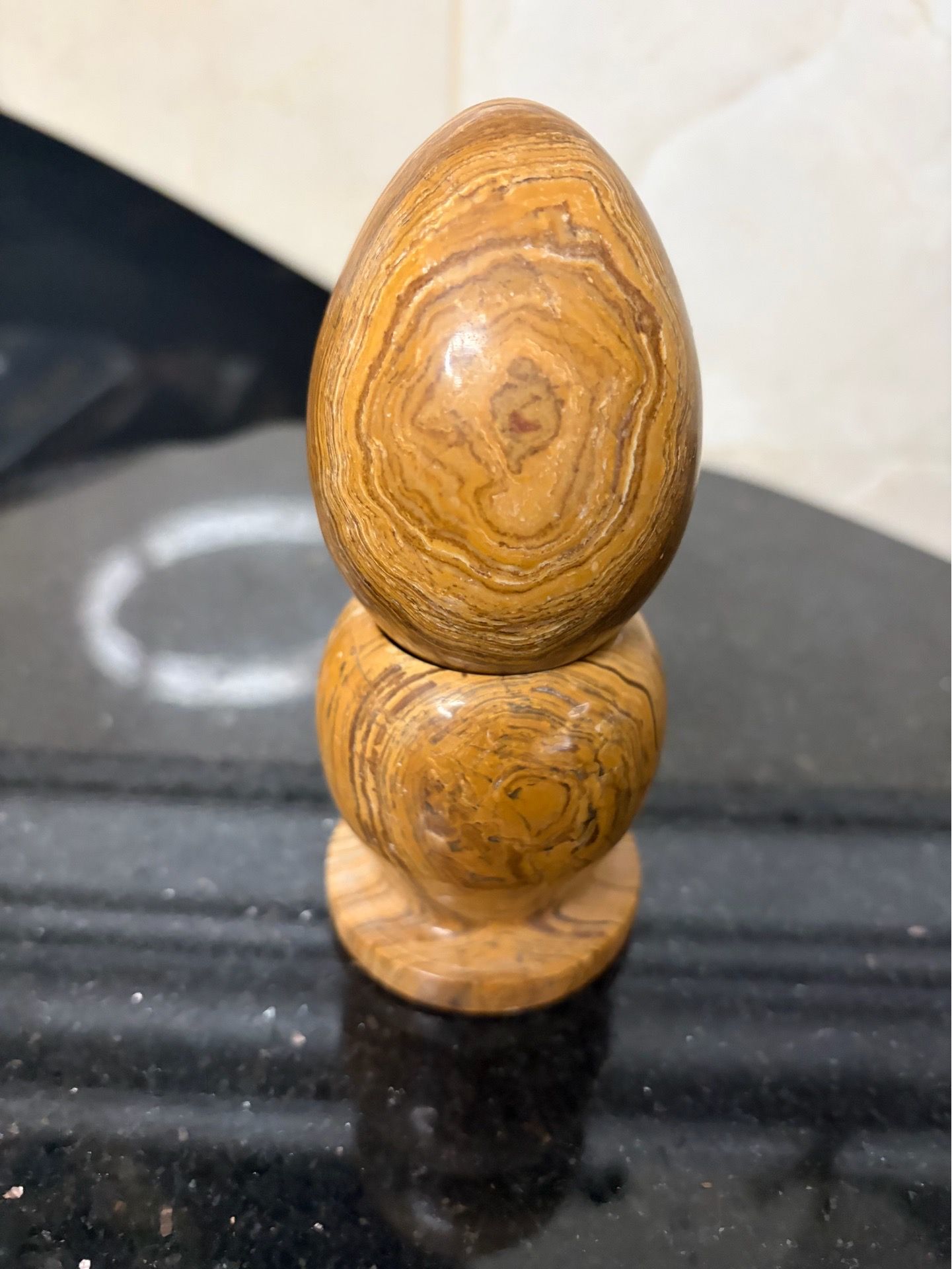 Tiger eye polished stone egg with stand
