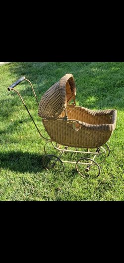 Antique wicker doll buggy