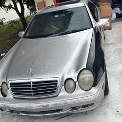Silver Mercedes Coupe Clk 320