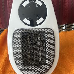 Wall outlet space heater