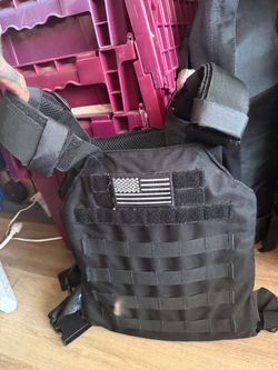 Black plate carrier vest with level II plates