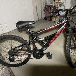 26” hyper shocker 18 speed dual suspension mountain bike great shape rides perfect