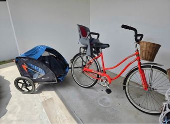 Family bike package including a Hampton Cruiser beach bicycle, rear child seat, and Schwinn child trailer.