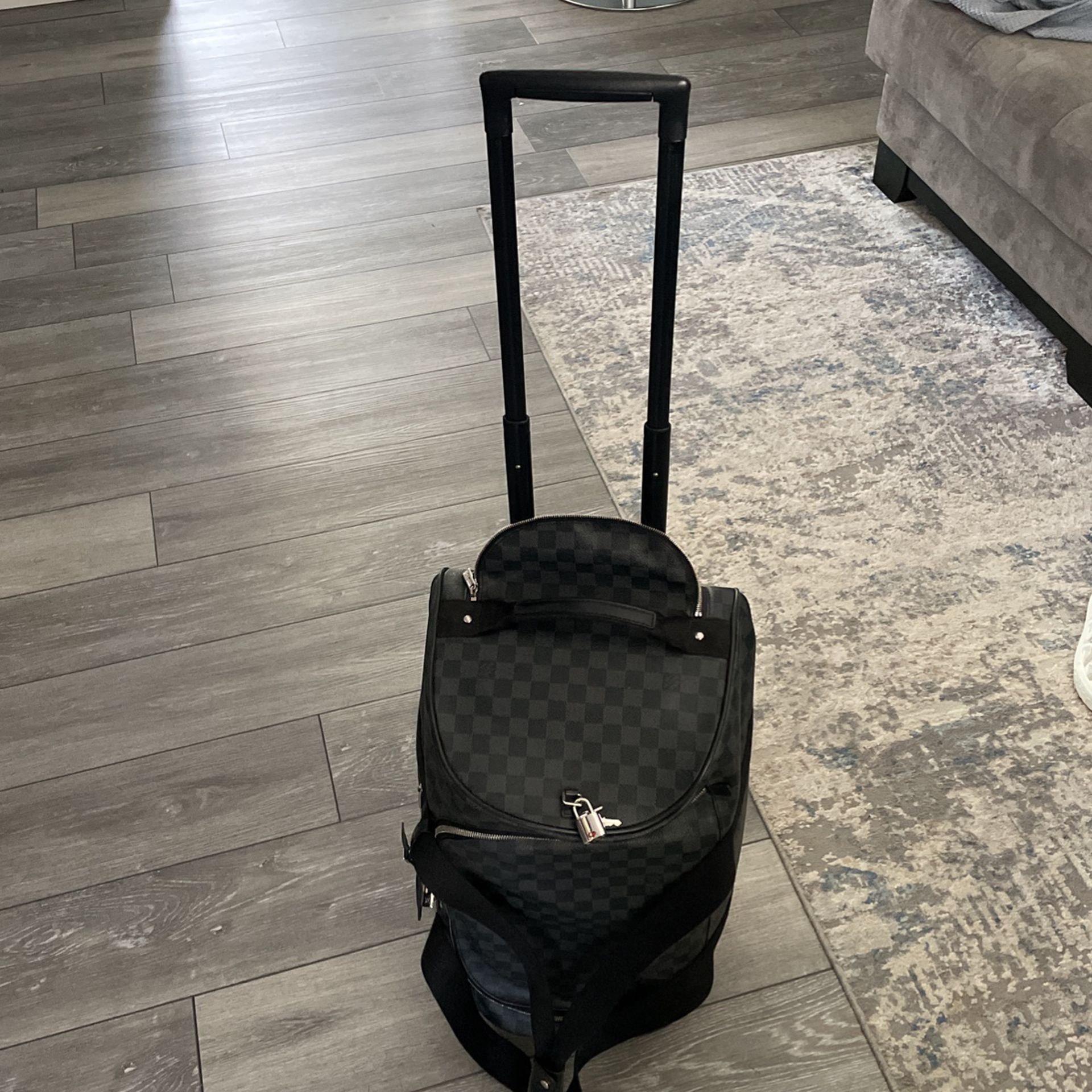 Louis Vuitton Carry on Rolling Luggage 