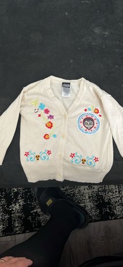 Box lunch Disneys Coco sweater.