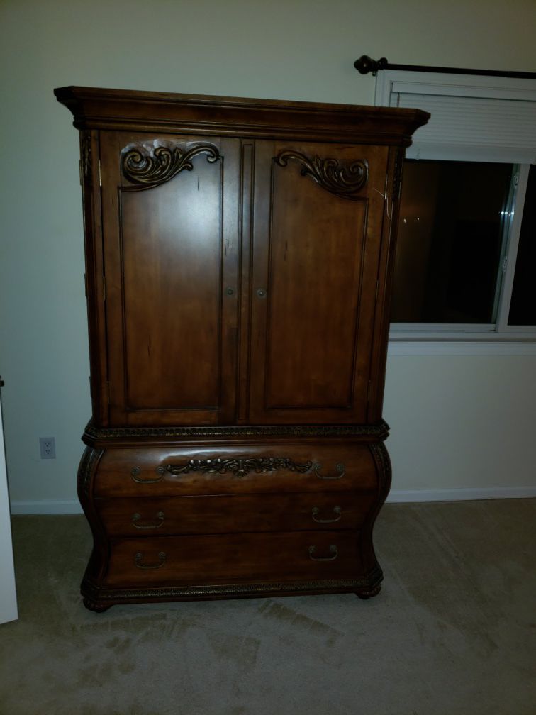 Price drop!Free if picked up this coming weekend! Wardrobe/Entertainment Cabinet with drawers