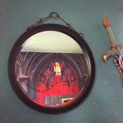 Round Mirror with Dark Frame and Chain