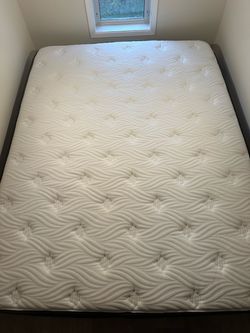 Barely used queen mattress
