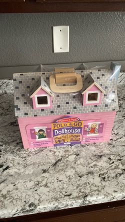 Melissa & Doug fold and & go wooden dollhouse
