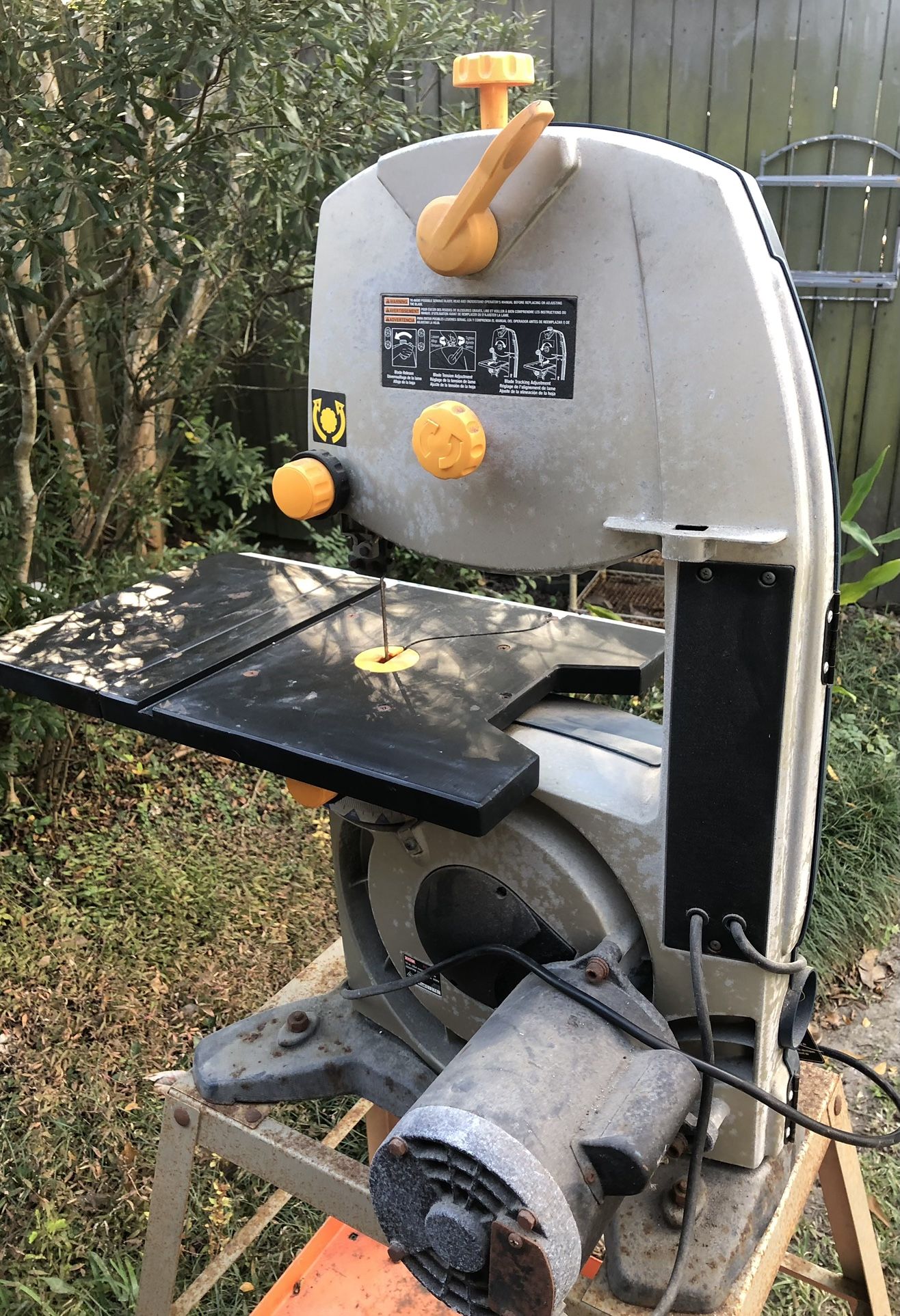 Ryobi 10” band saw on a metal stand