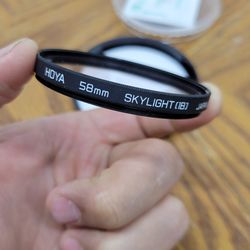 Hoya 58mm Skylight (1B) camera lens filter.