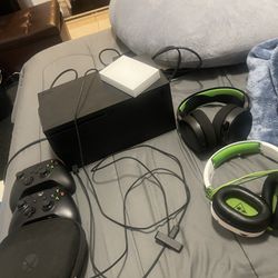 Xbox series x 1tb for sell comes with 1 elite 2 series controllers wireless and cordless headset 2 