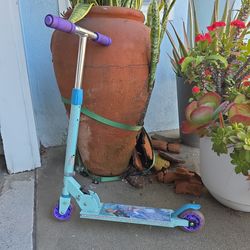 Disney Elsa scooter, lights up.