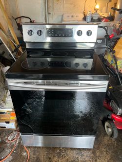 Samsung model # NE59M4310 Stainless Steel Glass Top Range oven 4 burners and warmer