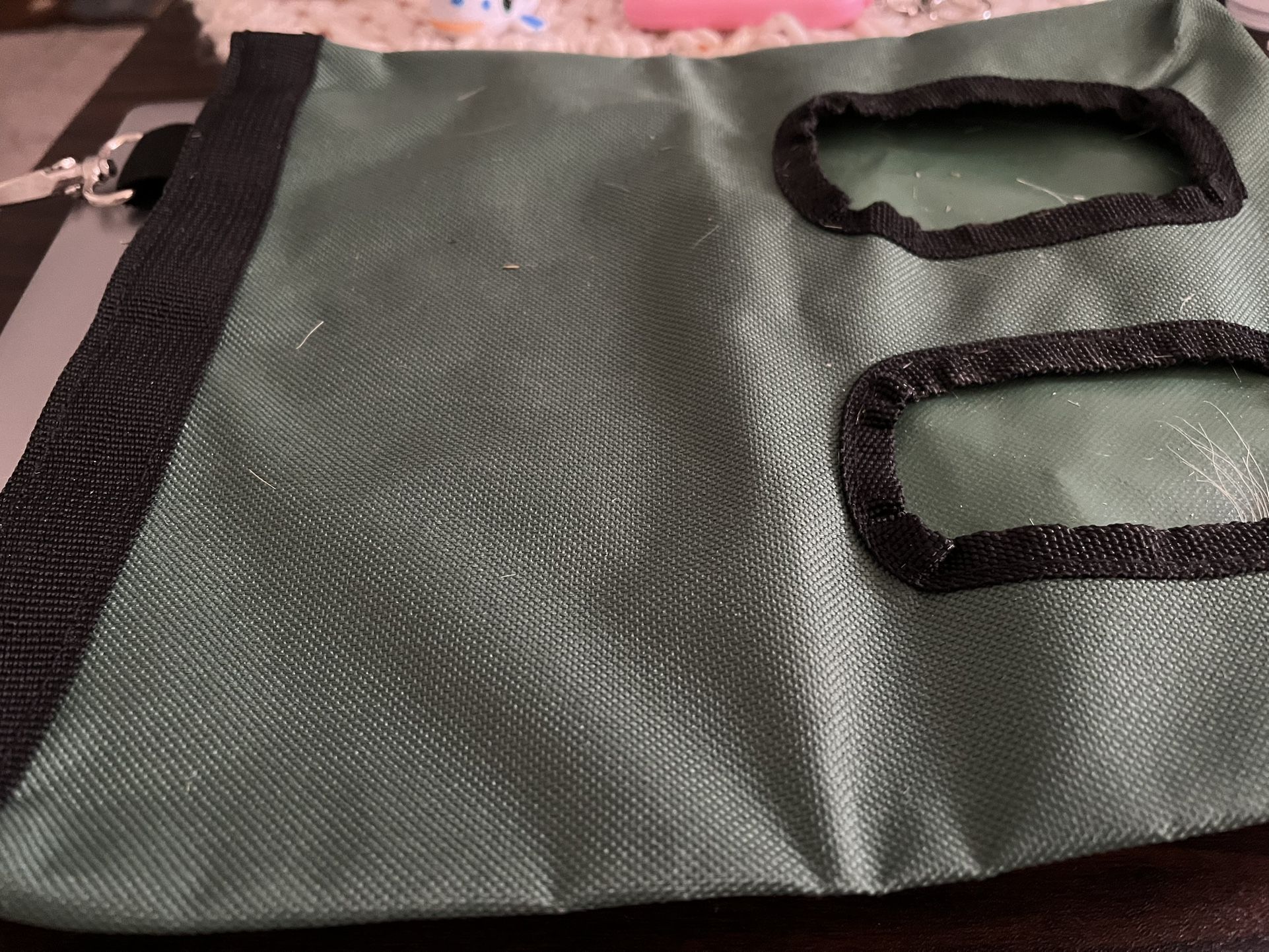 Used hay bag that hangs on cage for small animals