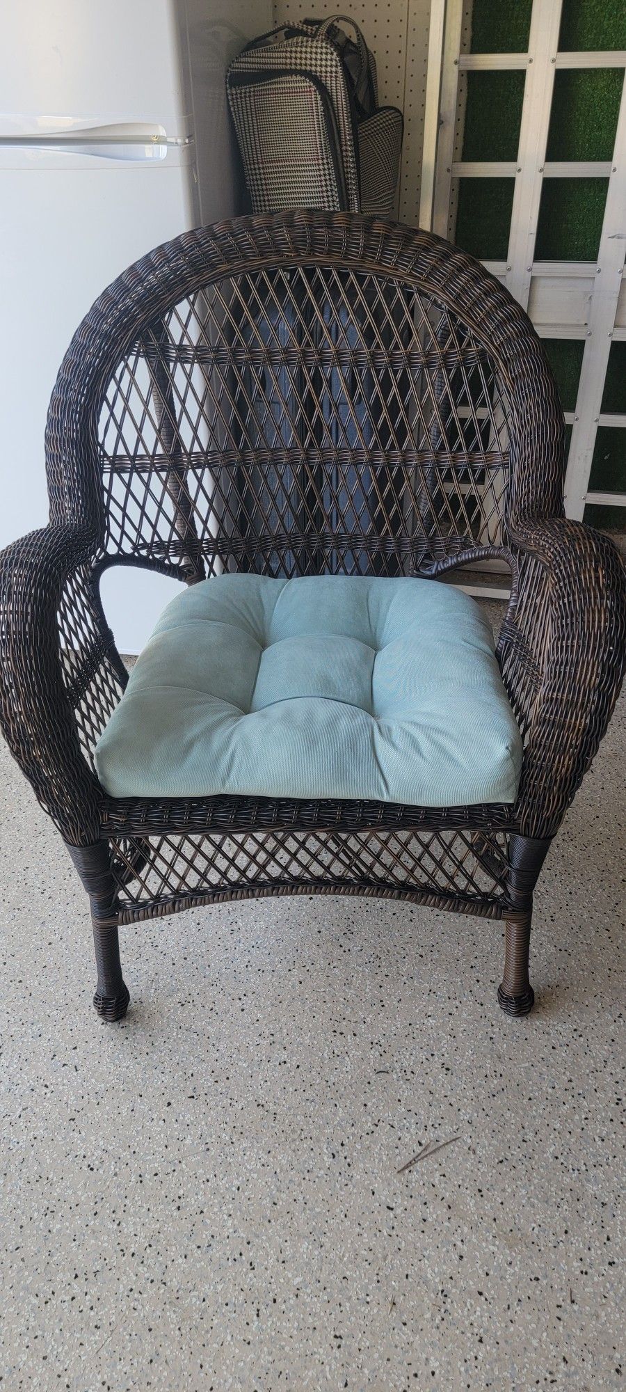 Beautiful Wicker Chair With Blue Cushion