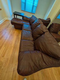 $250 - Brown Leather Couch - Four Pieces