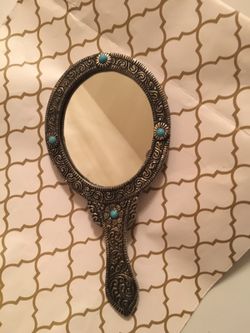 Hand held mirror