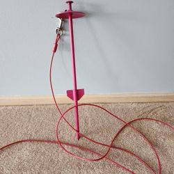 OUTDOOR YARD LEASH JUST STICK INTO YARD AND LET DOG RUN AND NO WORRIES OF DOG RUNNING AWAY. VERY STURDY METAL