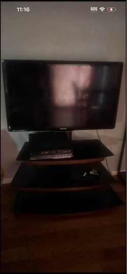 Tv stand with mount & Philips  tv including a vcr