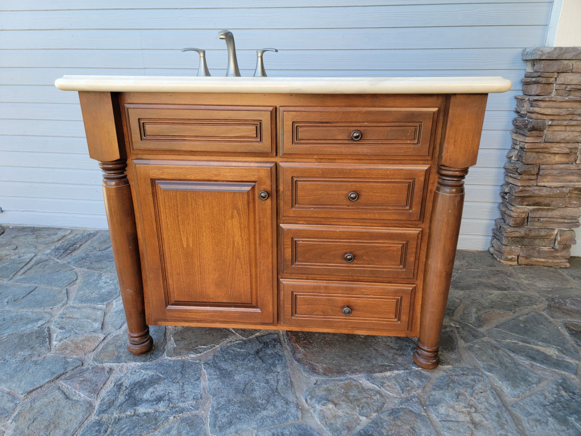 Vanity with granite and fouset