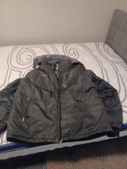 Men's 3XL winter coat with a pair of Men's winter boots size 10.5