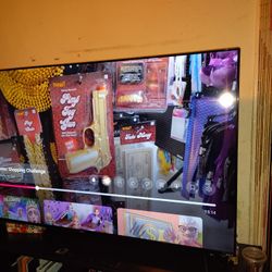 Roku TV Flat screen 70 In 