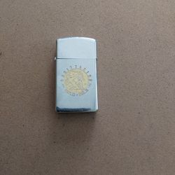 1983 Slim Zippo with Sagittarian Logo