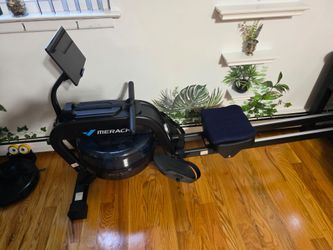 Merach water & magnetic rowing machine