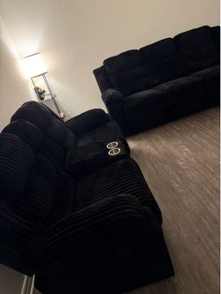 2 black couches