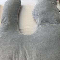 Momcozy brand body pillow for women or men. Comfortable machine washable cover