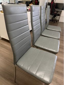 Set of four grey dinning chairs