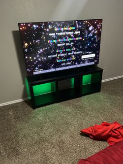 65 inch Samsung TV with a stand
