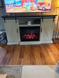Entertainment center with fireplace