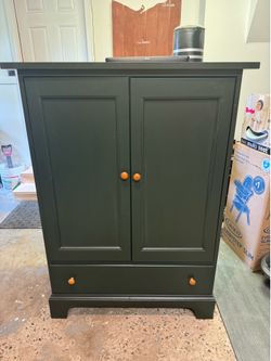 Solid wood entertainment center with TV