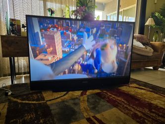 Mitsubishi 65" DLP TV.
