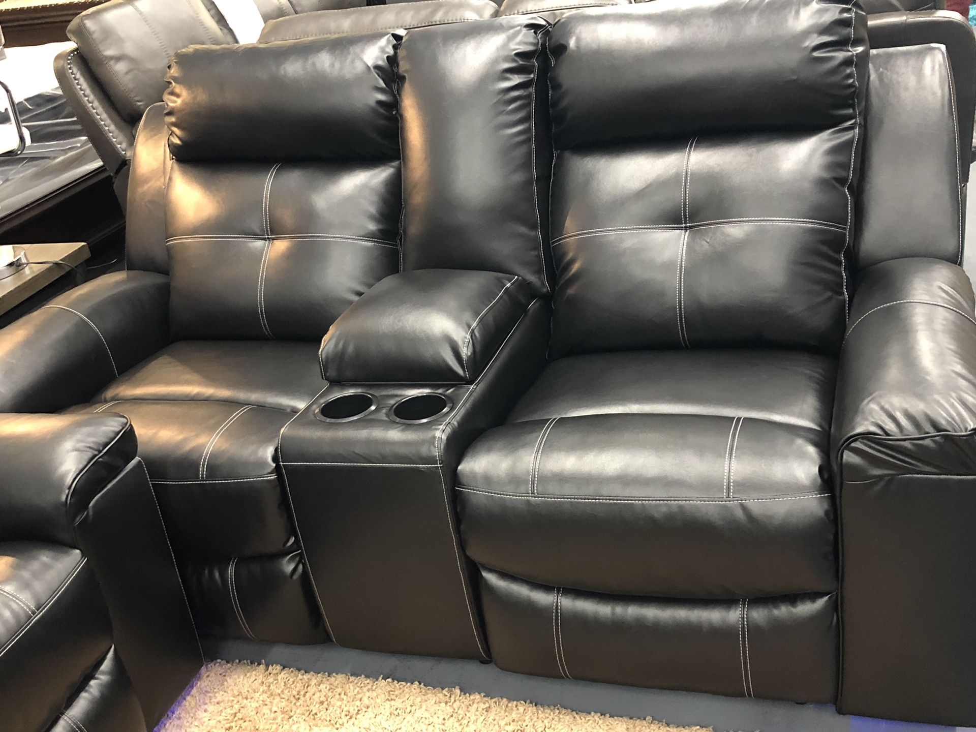 Brand new black leather reclining sofa and loveseat