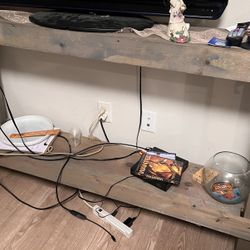 Behind the couch table needs to be picked up today