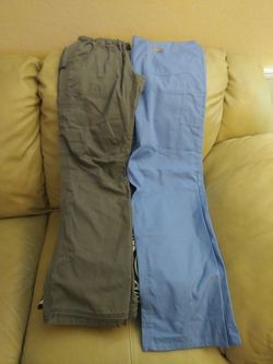 Gentle used nursing scrubs. Blue pair is brand new without tags.