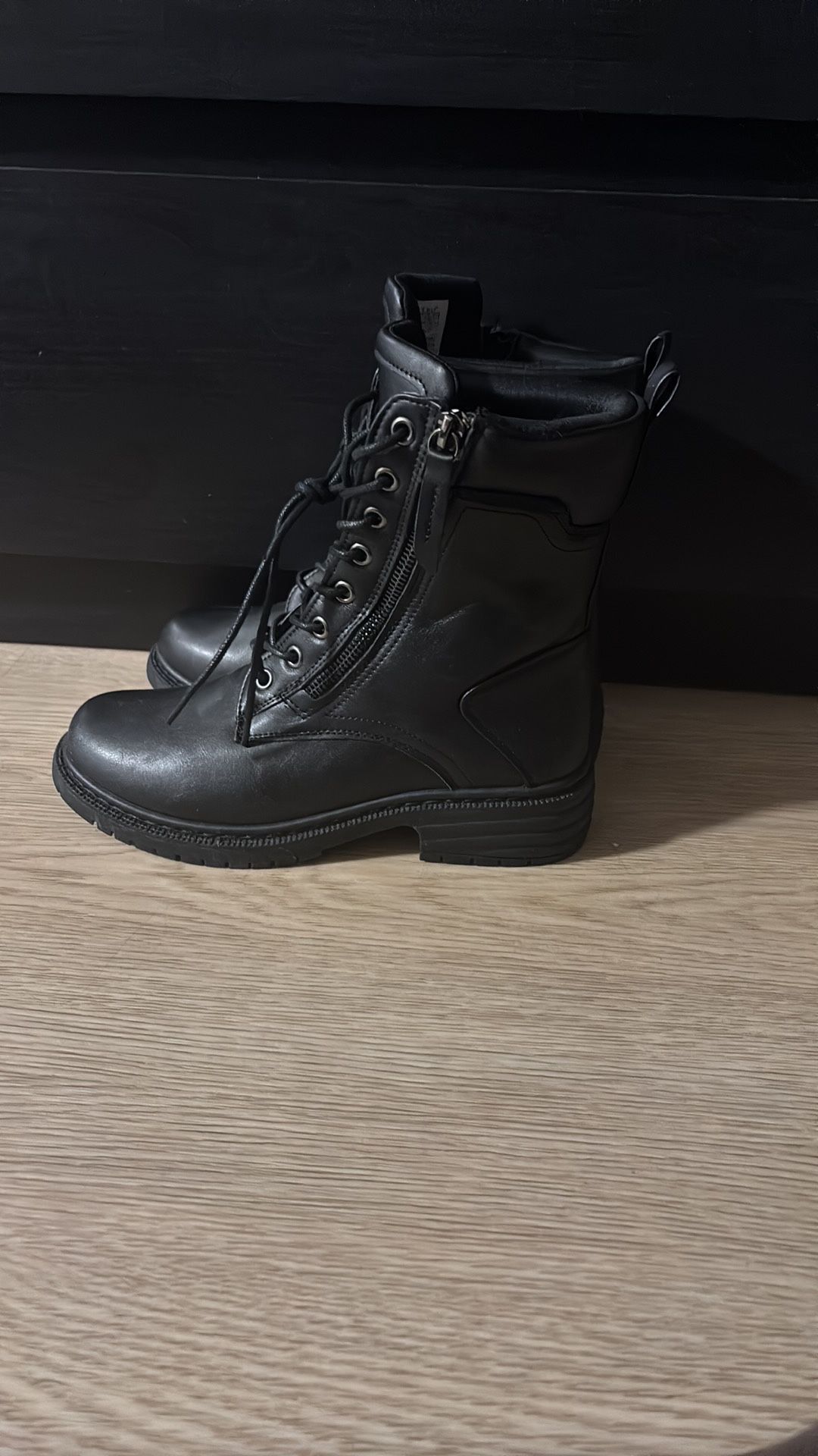 Black Combat Boots with Rugged Design and Sturdy Sole
